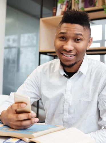 kid studying with a phone