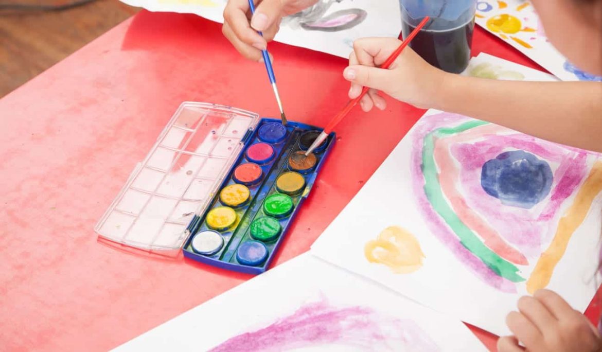 kid painting watercolors