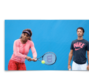 tennis player with coach watching