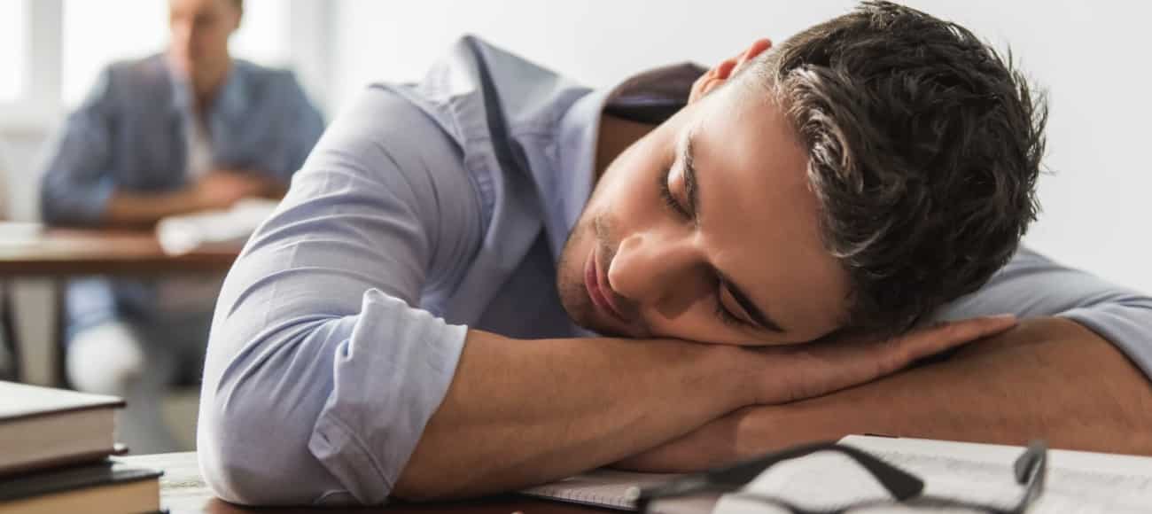 student asleep on desk