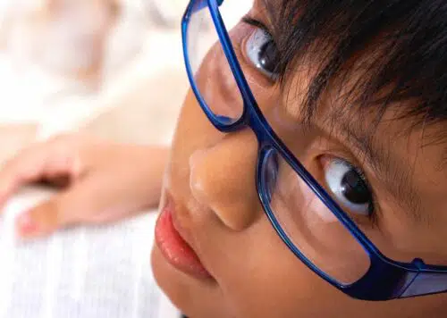 kid reading a book