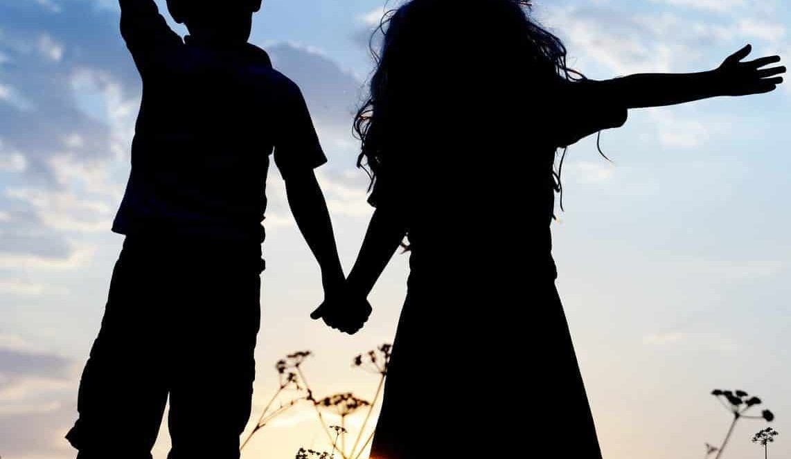 silhouette of happy children