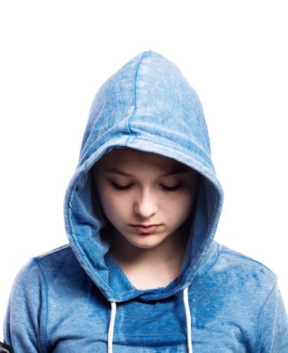 sad girl in blue hoodie