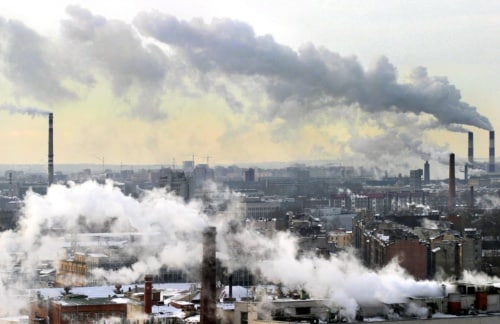 A smoke from the chimneys billow over St. Petersburg, 03 March 2005. Russia's greenhouse gas emissions fell by up to 38 percent between 1990 and 1999 due to its economic collapse in the early 1990s, according to a UN report, giving Moscow broad room to manoeuvre despite recent rapid economic growth. The Kyoto Protocol, the strictest environmental agreement concluded by the international community, entered into force thanks to its ratification by Russia in October 2004. AFP PHOTO / SERGEY KULIKOV / INTERPRESS (Photo credit should read SERGEY KULIKOV/AFP/Getty Images)