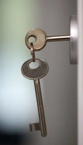 old fashioned keys in a lock