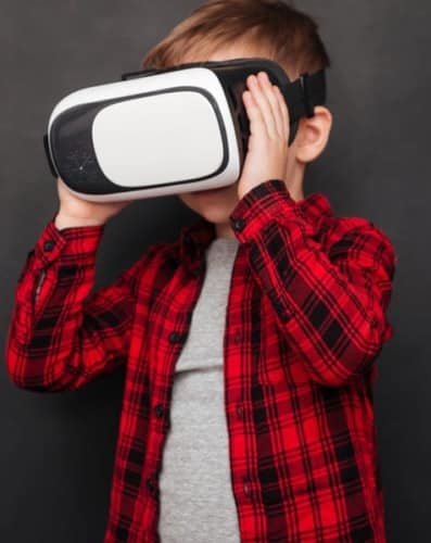 Child in VR goggles