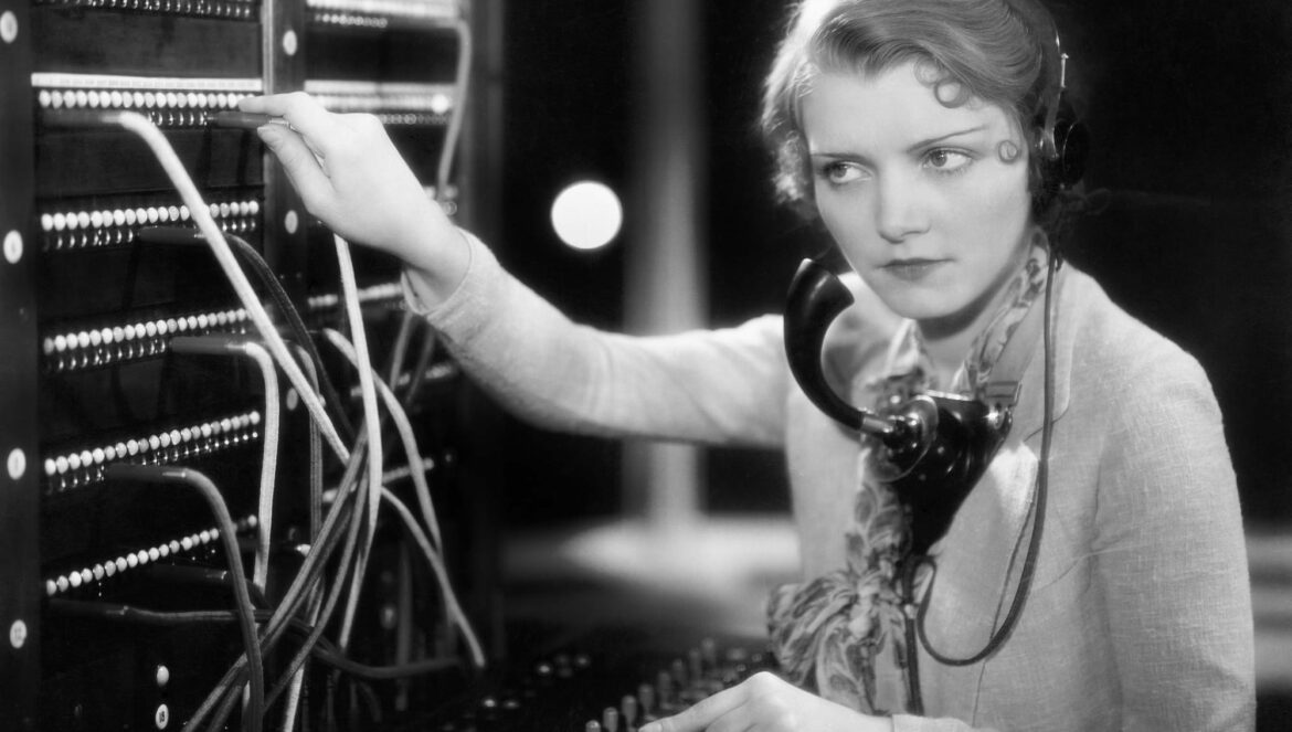 Young woman working as a telephone operator