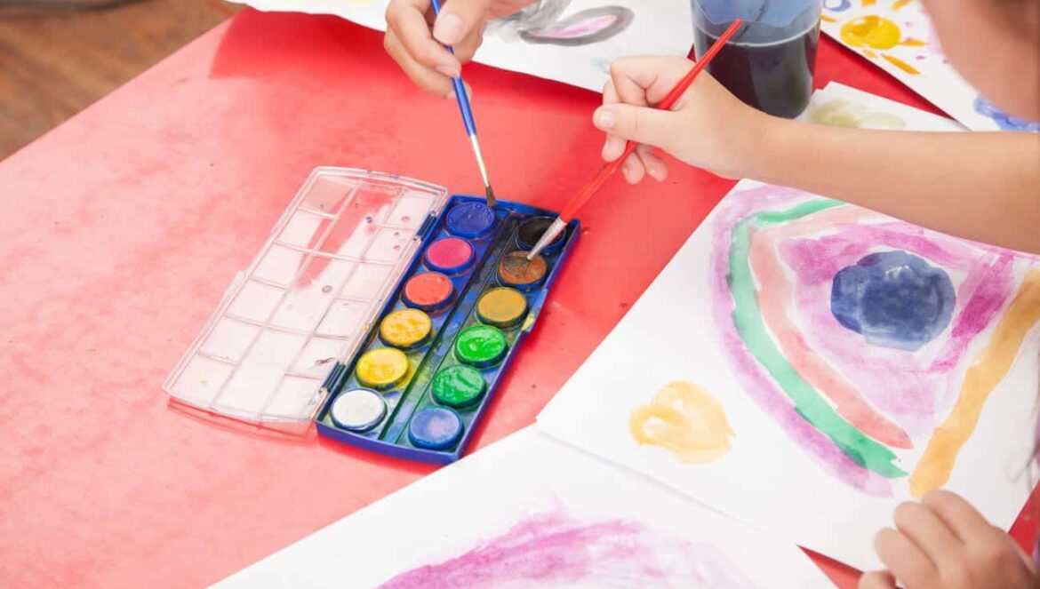 kid painting watercolors