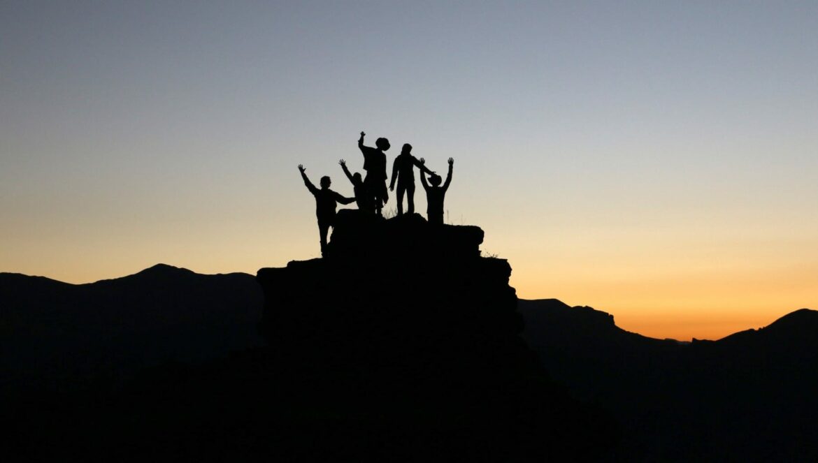 people together dusk hill top