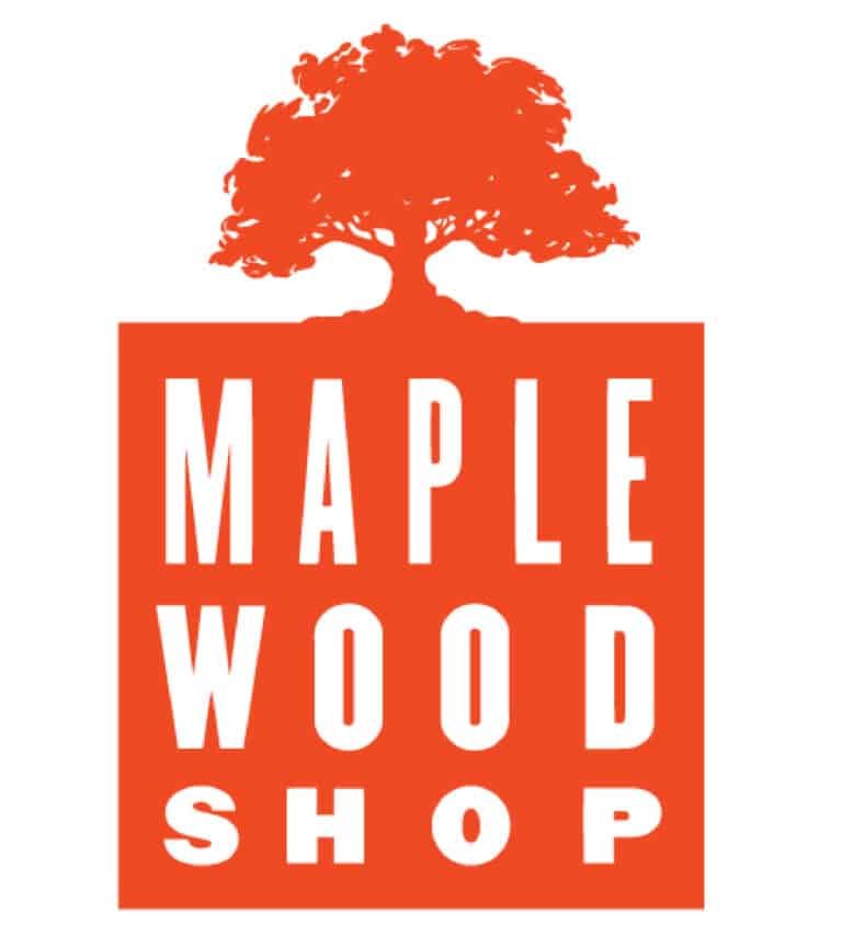 An orange logo featuring a silhouette of a large tree above the words MAPLE WOOD SHOP in bold, white, uppercase letters, all enclosed within an orange rectangle.