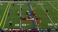A college football game is in progress with the offense lined up at the 30 yard line The scoreboard shows Winston Salem St 7 Shaw 6 2nd quarter 1143 remaining 1st  10 is marked on the field