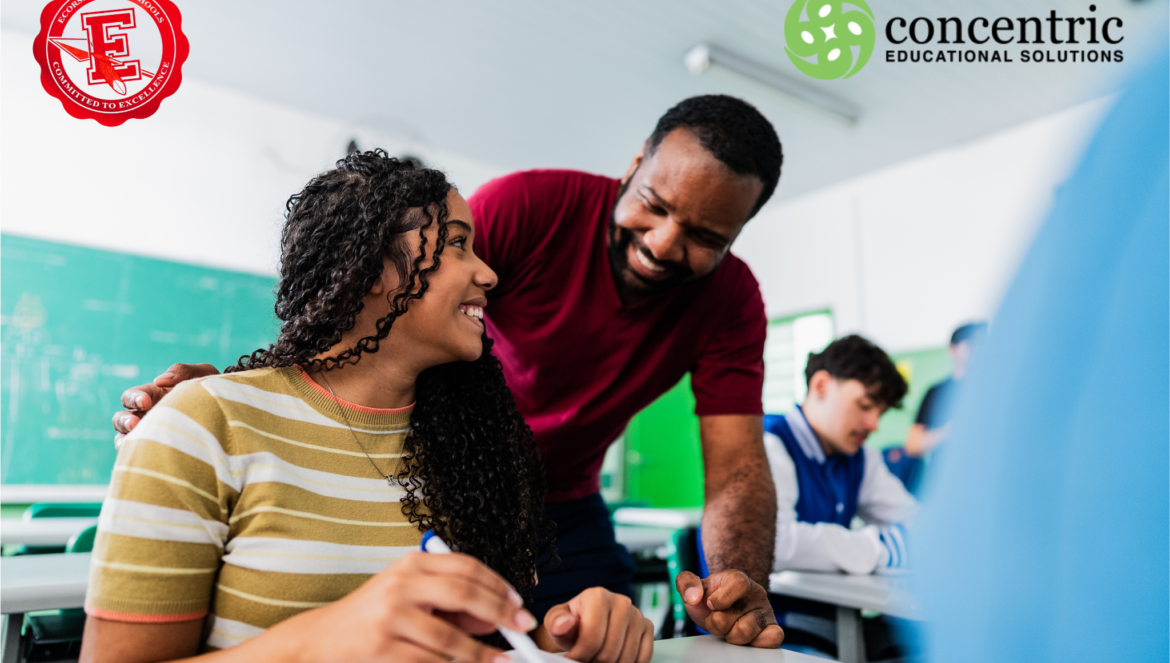 Students in a classroom smiling while writing at desks logos appear at the top corners red school seal left green concentric logo right