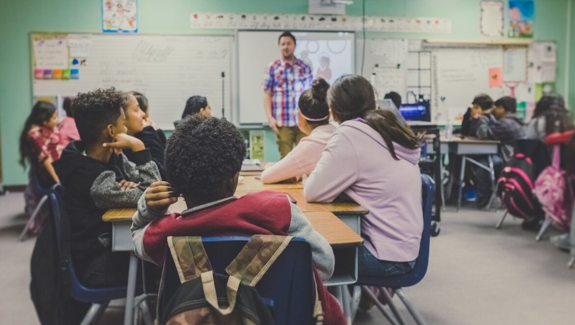 From learning loss to lasting impact | edcircuit Students in classroom with teacher presenting