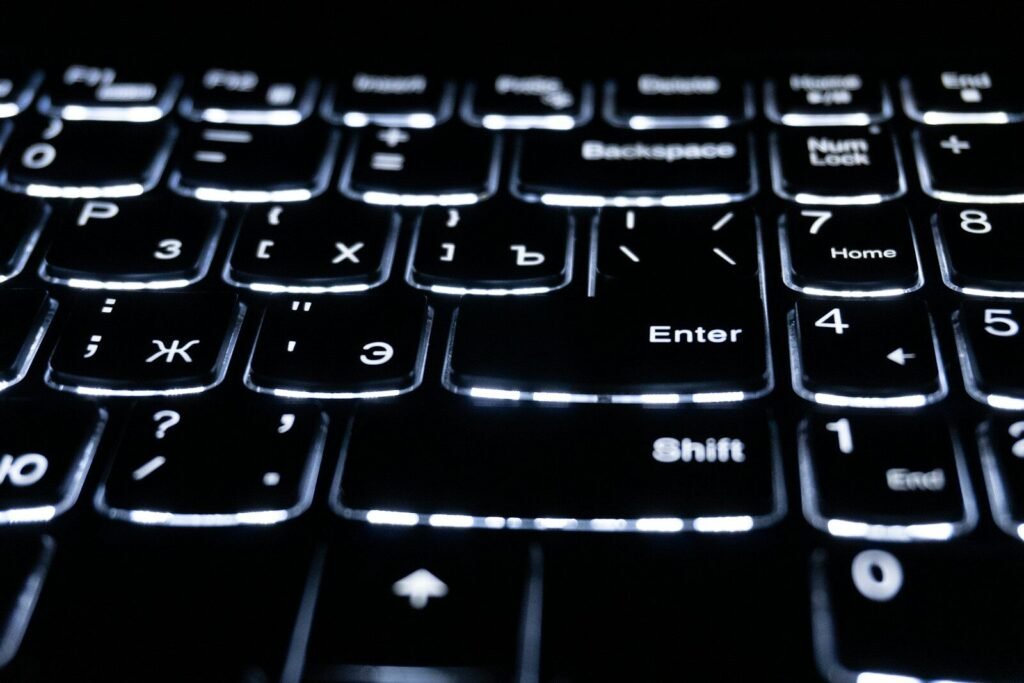 Closeup of a backlit keyboard with glowing keys | edCircuit Close up of a backlit keyboard with glowing keys