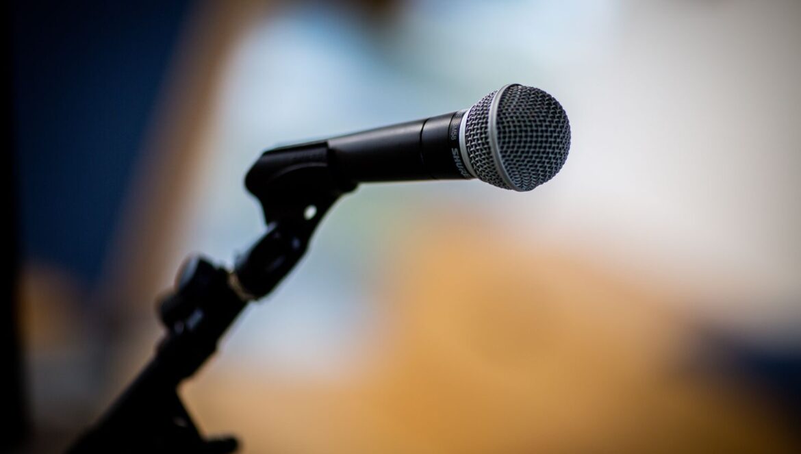 Dynamic microphone closeup with blurred background highlighting its d | edCircuit Dynamic microphone close up with blurred background highlighting its d