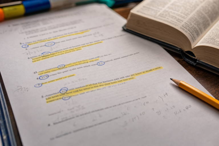 Math exam word problem with words highlighted and numbers circled, the English inside math