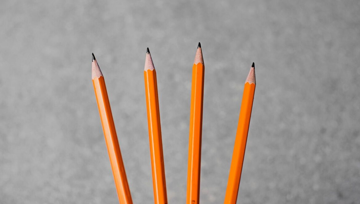 Highquality minimalist photo of four sharp yellow pencils on a neutra | edCircuit High quality minimalist photo of four sharp yellow pencils on a neutra