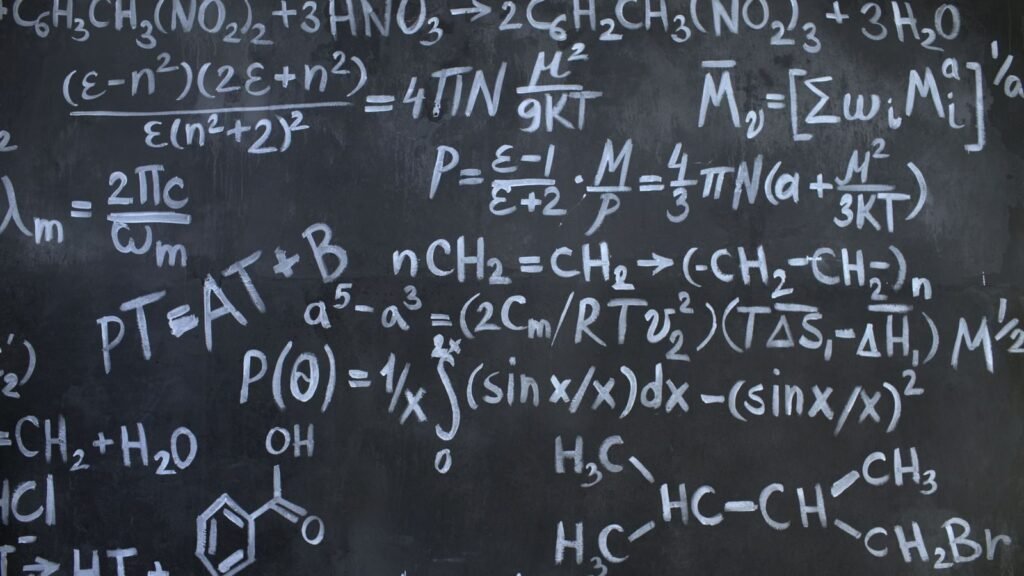 Intricate mathematical and chemical equations chalked on a blackboard symbolizing education and science | edCircuit Intricate mathematical and chemical equations chalked on a blackboard symbolizing education and science
