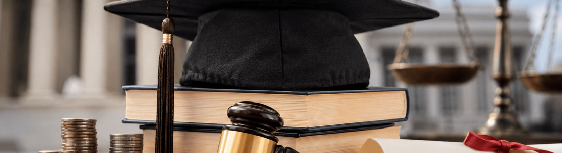 A judge's gavel, graduation cap, stacked books, diploma, and coins are arranged on a table—symbolizing student loan caps—with a courthouse and scales of justice in the background.